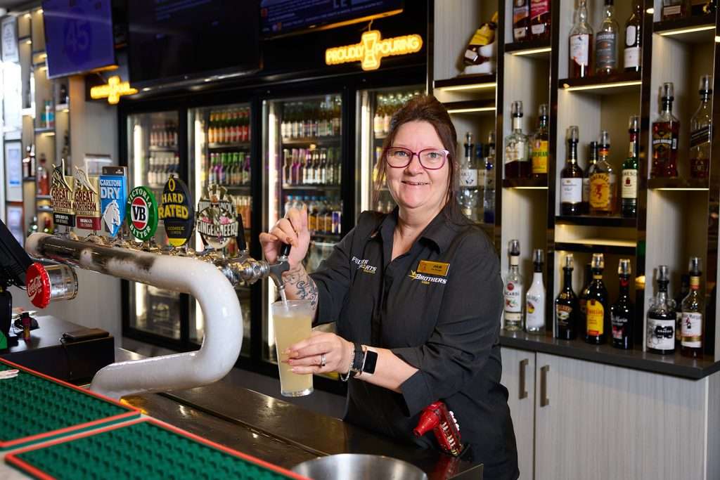 Enjoy a cold drink at the bar at Fuller Sports Club Edmonton